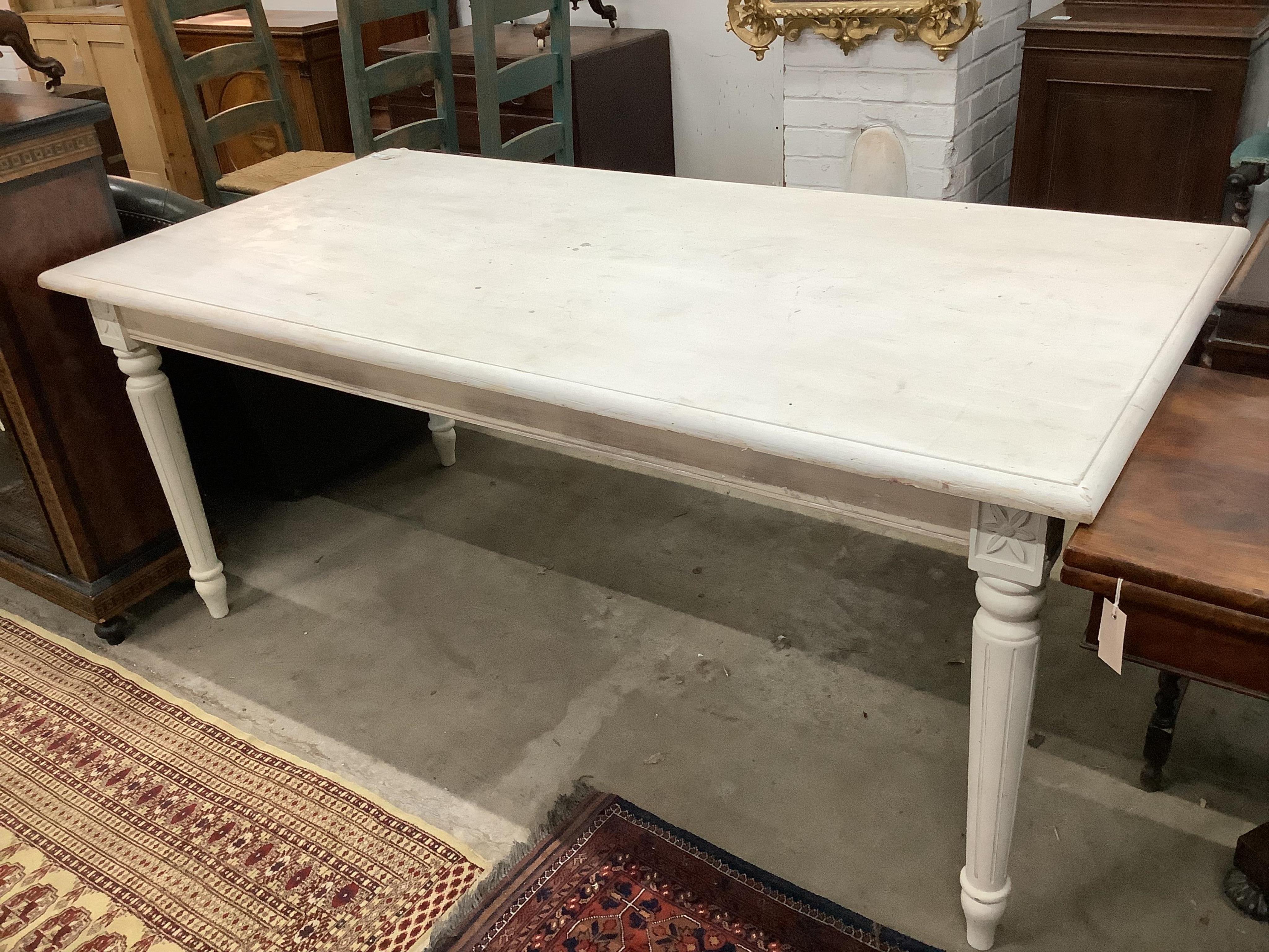 A Victorian style painted rectangular dining table, width 180cm, depth 90cm, height 78cm, and six painted rush seat ladder back dining chairs